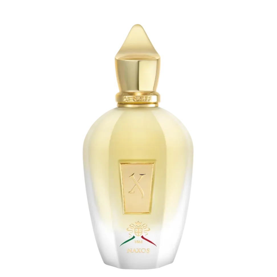 A luxury perfume bottle by Naxos, featuring a faceted clear glass body that transitions from pale yellow at the top to clear/white at the bottom, topped with a metallic gold cap and a gold crest emblem on the front.
